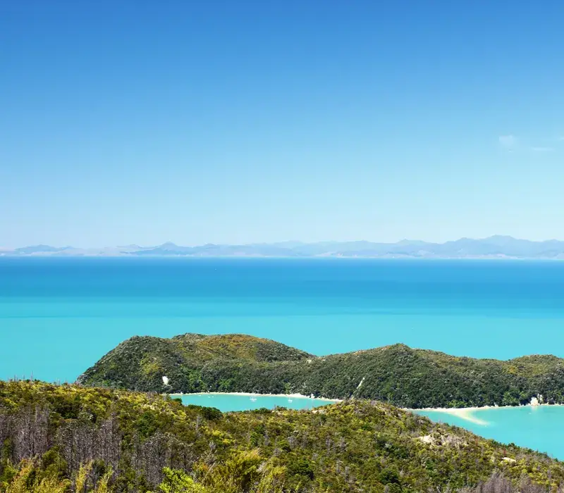 Coastal viewpoint over blue bays at the top of the South Island