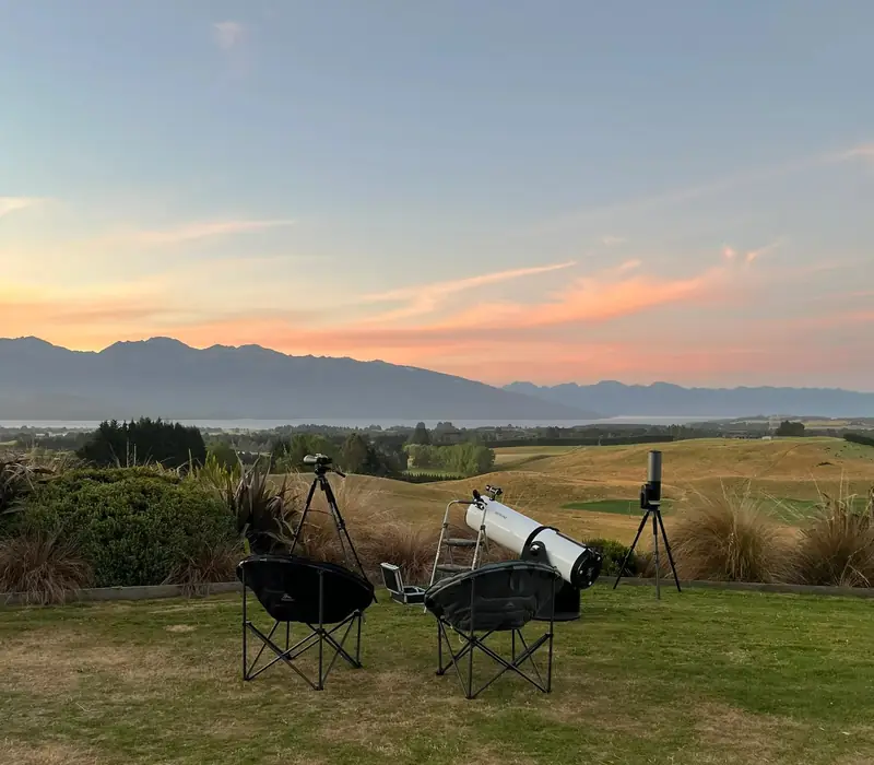 Telescopes set up at dusk for a southern stargazing session